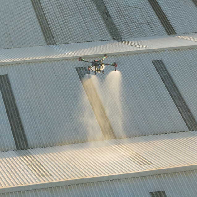 Moss, Mold & Lichen treatment being sprayed on a commercial building in the North Island with a drone